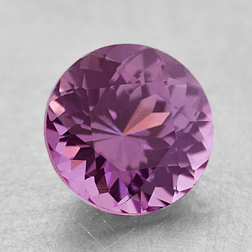Loose Medium Reddish-Purple Round Brilliant Sapphire