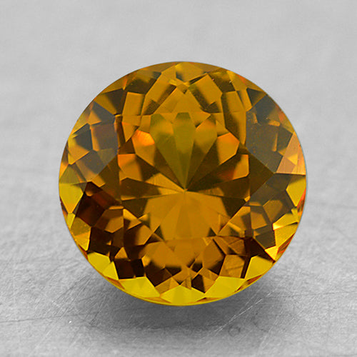 Loose Vivid Orangeish-Yellow Round Brilliant Sapphire