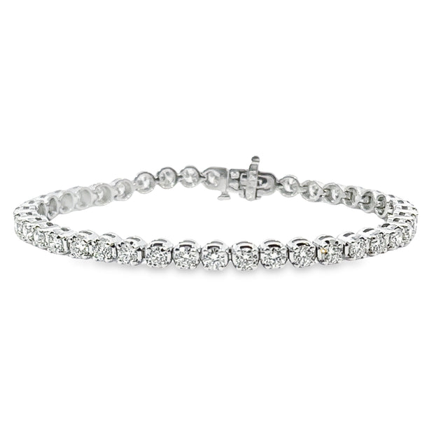 Adorned with 40 diamonds, this 6.47ct De Beers Forevermark tennis bracelet  is a true work of art. ⁠ ⁠ Discover our wide range of Tenn... | Instagram